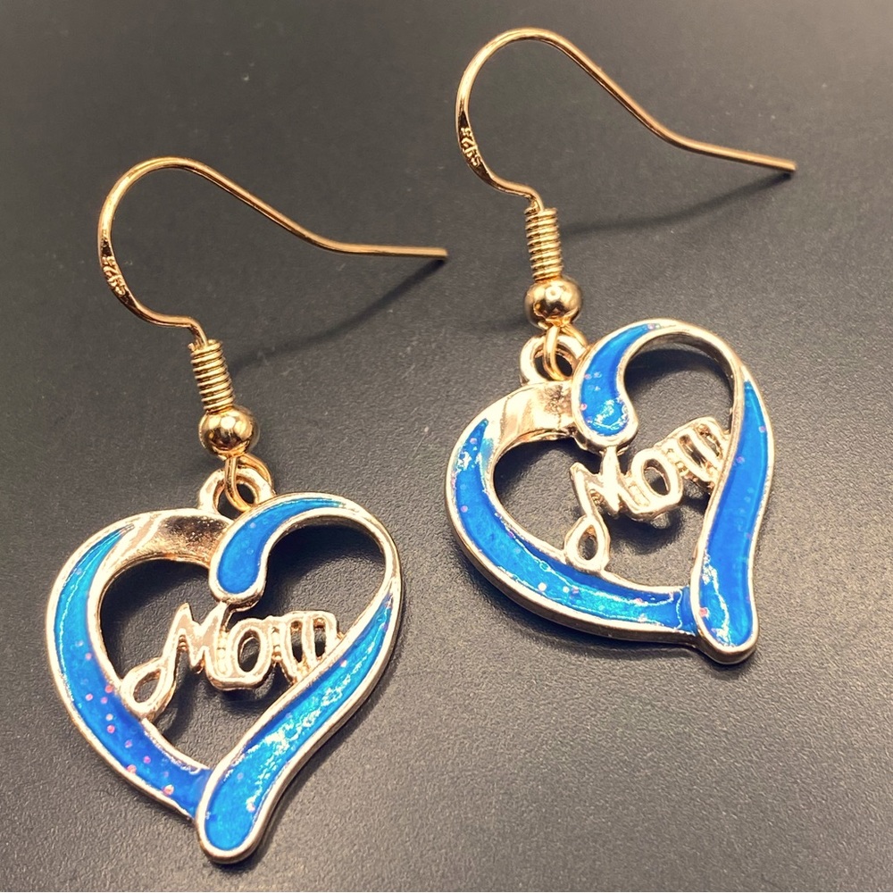 Rose gold tone heart shaped blue glittery with mom in the center